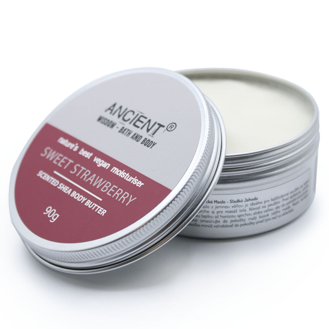 A 90g jar of pink-toned shea body butter featuring a sweet strawberry fragrance and premium label.