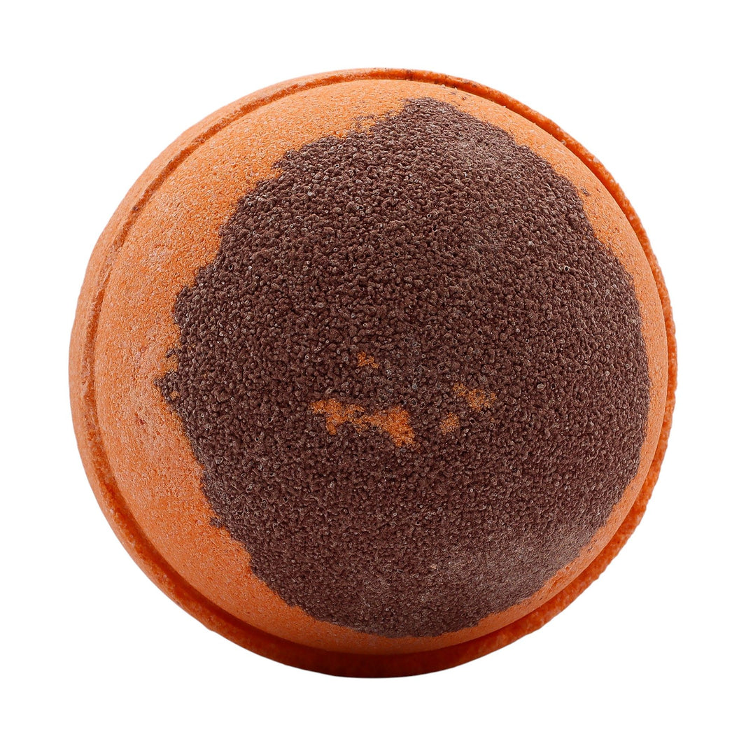 A large spherical bath bomb with a dual-tone brown and orange finish, showcasing a warm, spiced winter scent profile.