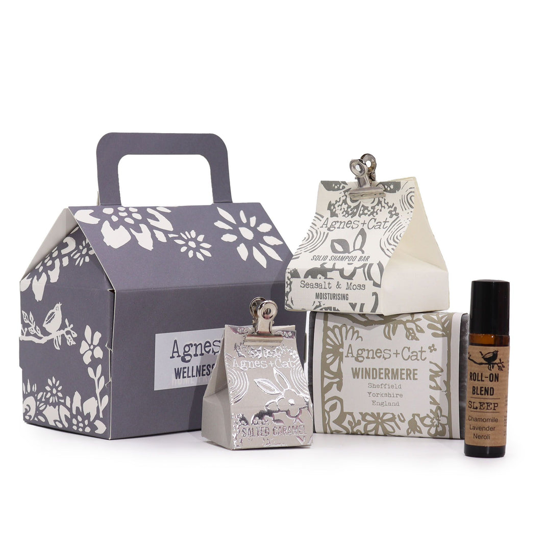 A professional gift box containing a variety of Lake Breeze scented bath products and a candle in a grey gift presentation.