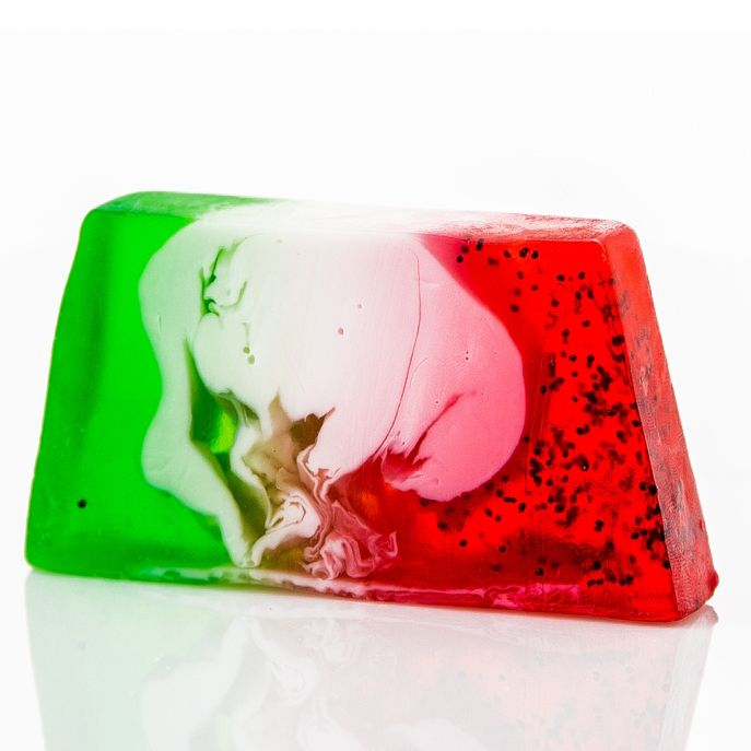 A 100g artisan soap slice designed to look like a watermelon with vibrant green, white, and red layers.