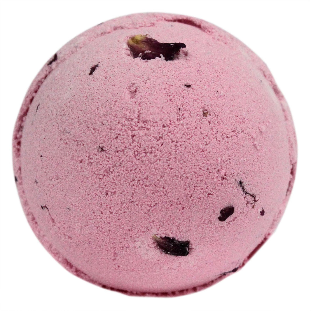 A large 180g pink round bath bomb decorated with real dried rose petals for a luxury floral and moisturizing bath.