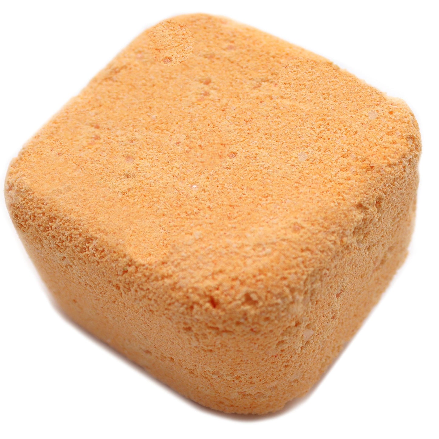 An orange square-shaped shower steamer tablet with a textured surface, designed to release invigorating aromatherapy scents in the shower.