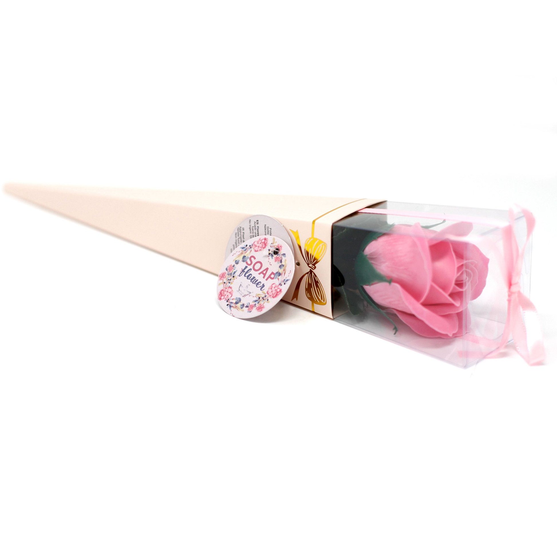 A single pink soap rose flower presented on a stem with realistic green leaves and gift packaging.