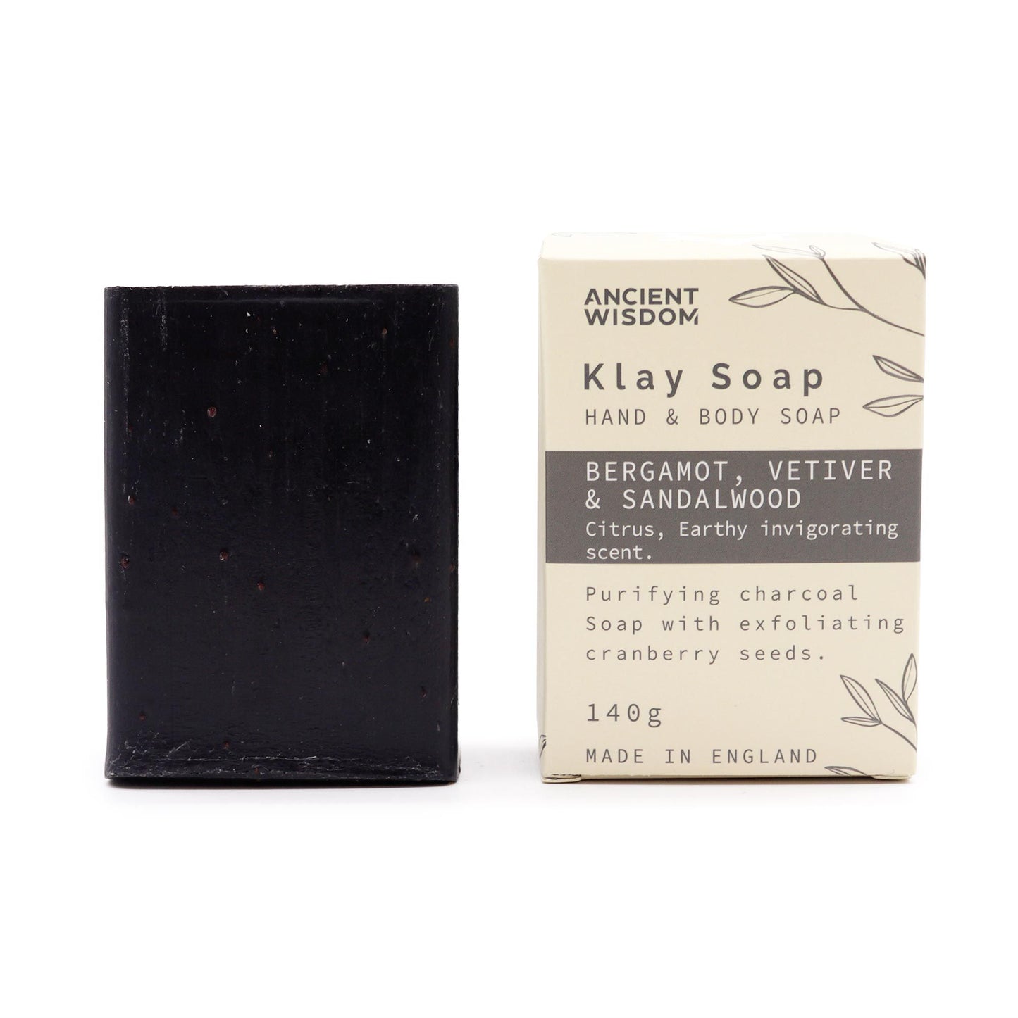 A dark-toned handcrafted clay soap bar with a luxury bergamot and sandalwood fragrance.