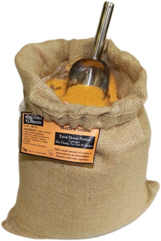 A massive 7kg hessian sack of Total Detox Potion bath salts with an orange label, ideal for bulk aromatherapy and wellness.