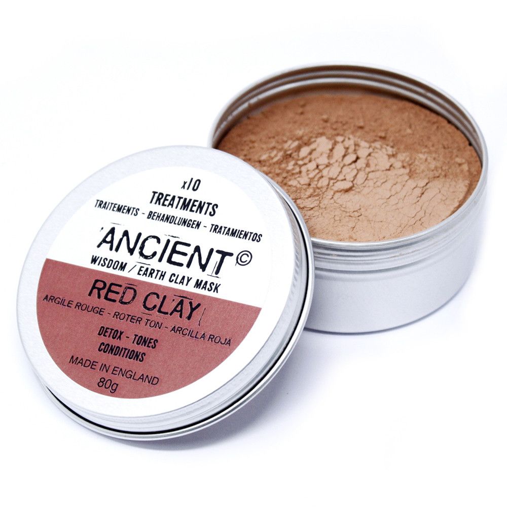 A metal tin containing 100g of fine red clay powder for natural facial mask treatments.