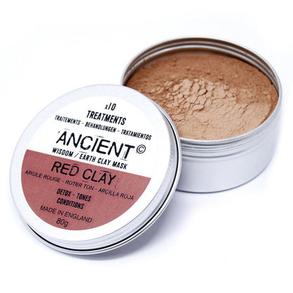 A metal tin containing 100g of fine red clay powder for natural facial mask treatments.