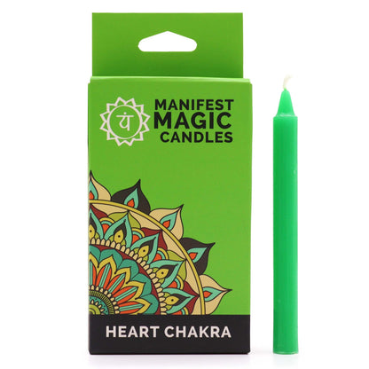 A green ritual candle box showing heart chakra motifs, holding twelve slim green candles for intention setting.