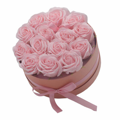 A round decorative gift box filled with 14 realistic pink soap roses, ideal for birthdays or Mother's Day gifts.
