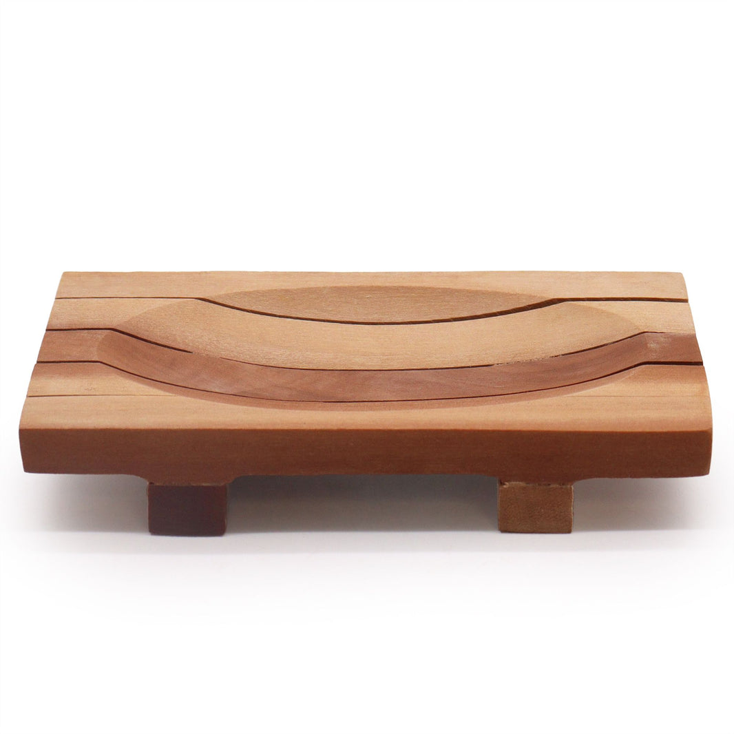 A rectangular mahogany wood soap holder featuring deep horizontal drainage grooves and a rich, dark polished finish.