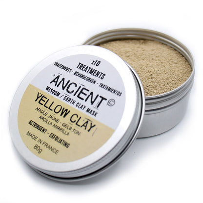 A metal tin containing 80g of fine yellow clay powder for natural skincare and facial mask treatments.