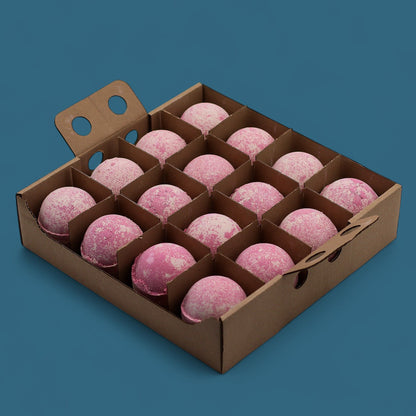 A cardboard display box containing 16 individually wrapped 180g pink and white marbled bath bombs.
