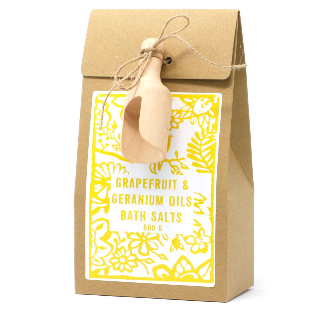 A 500g bag of aromatic bath salts featuring uplifting grapefruit and geranium essential oil blends.