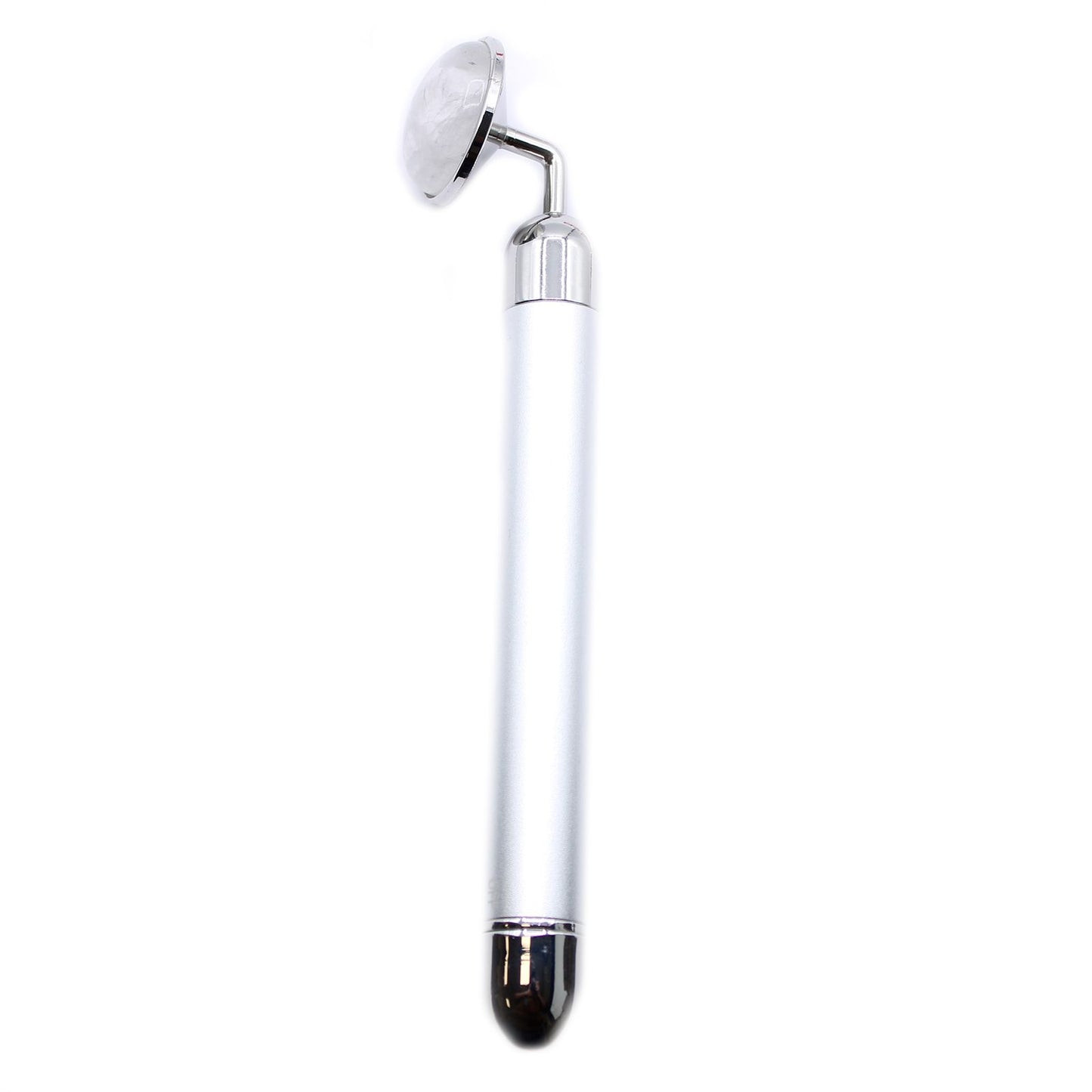 A polished clear rock quartz gemstone vibration pad designed for stimulating facial rituals and skincare absorption.