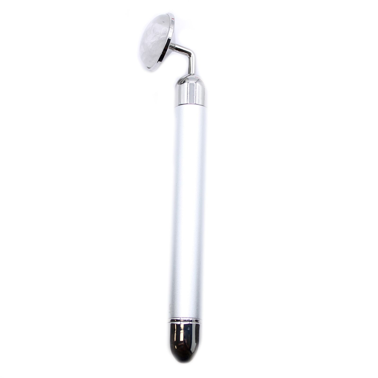 A polished clear rock quartz gemstone vibration pad designed for stimulating facial rituals and skincare absorption.