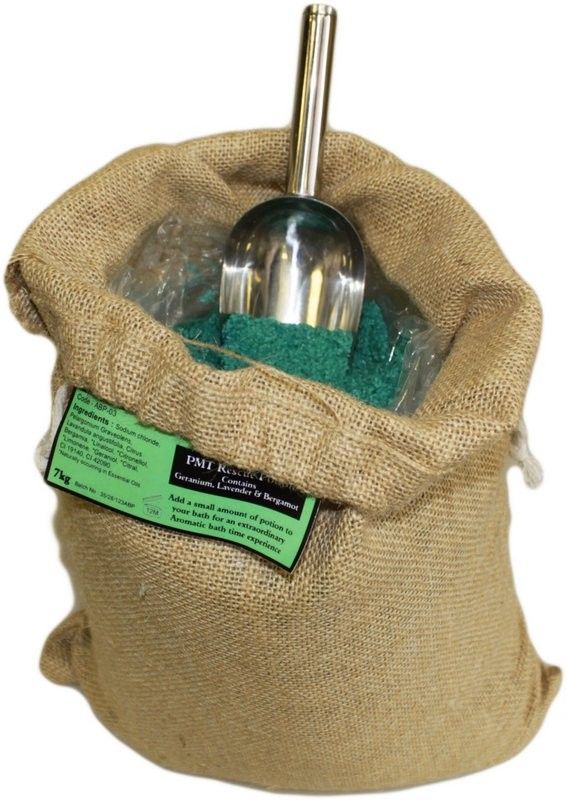 A large 7kg rustic hessian sack filled with PMT Potion bath salts, featuring a traditional apothecary scoop.