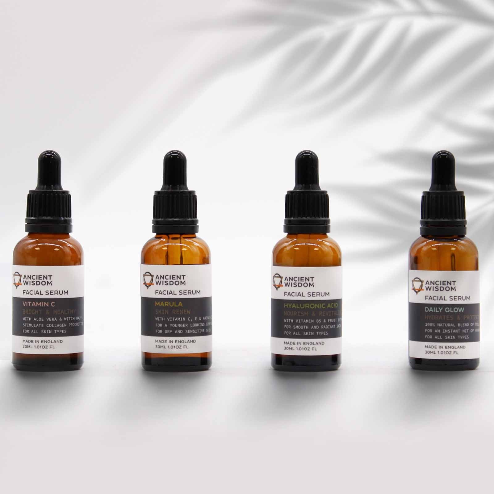 An amber glass dropper bottle of hyaluronic acid facial serum displayed with a modern, minimalist label.