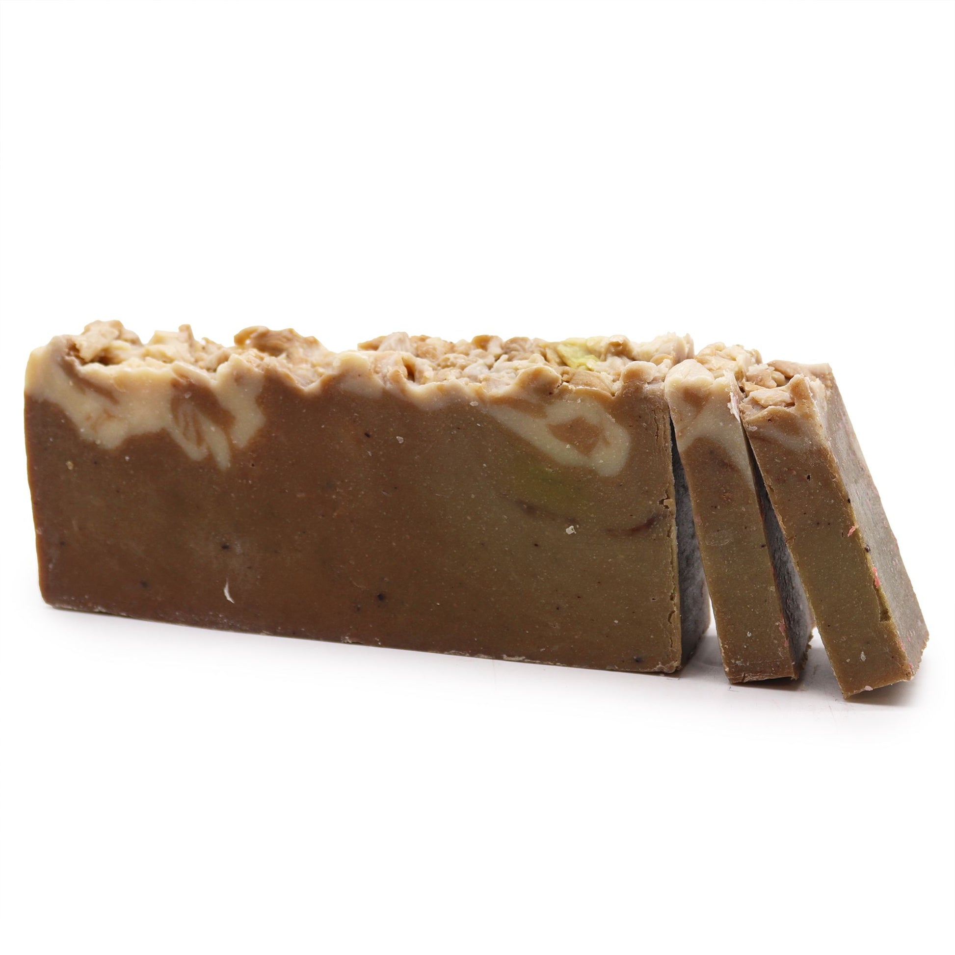 A handcrafted artisan soap slice with rich chocolate-brown layers, topped with real cocoa nibs and botanical textures.