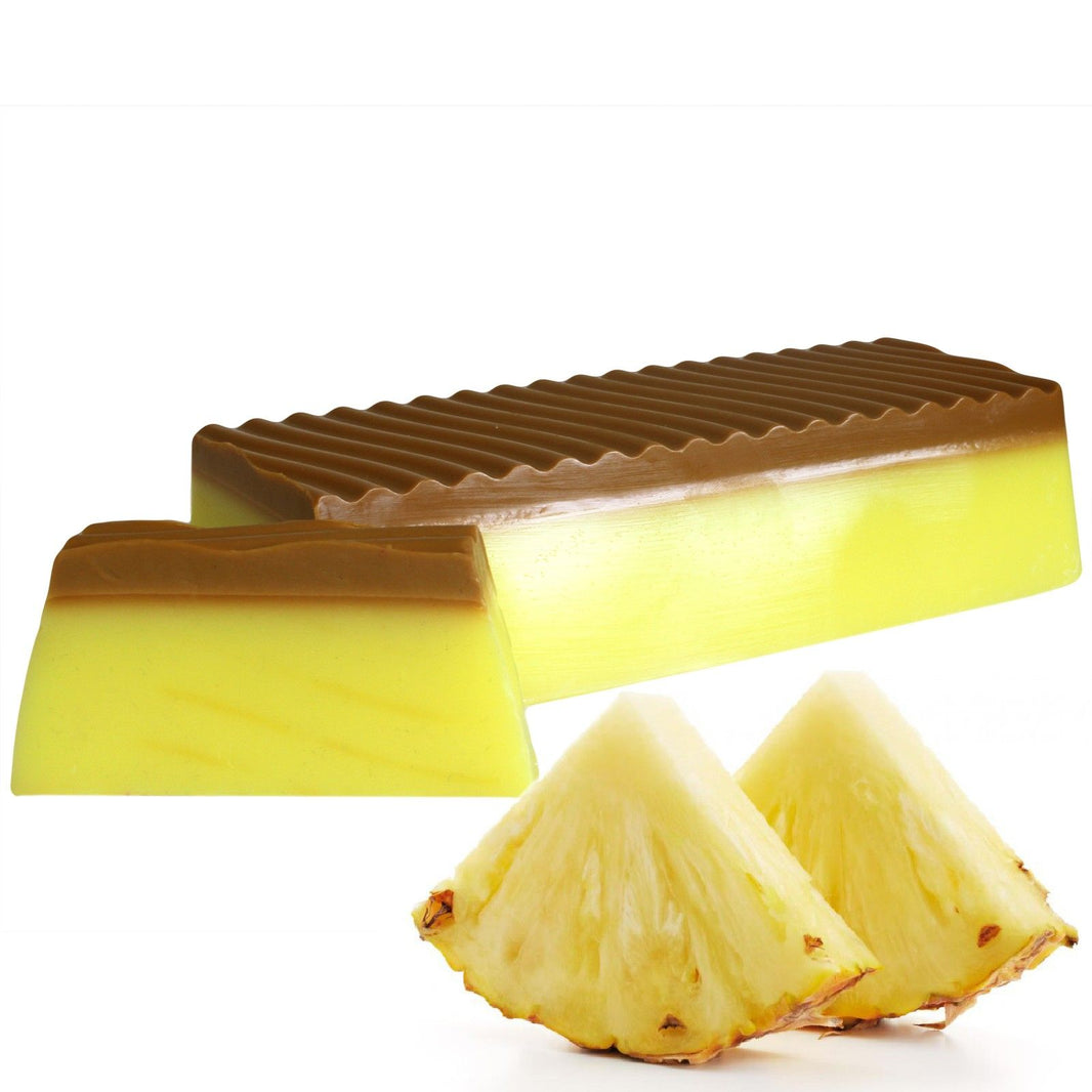 A bulk-sized 1.1kg handcrafted soap loaf with yellow and white botanical swirls, scented with tropical pineapple.