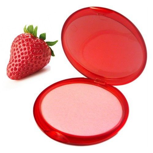 A round red travel case containing thin, strawberry-scented paper soap sheets for portable hygiene.
