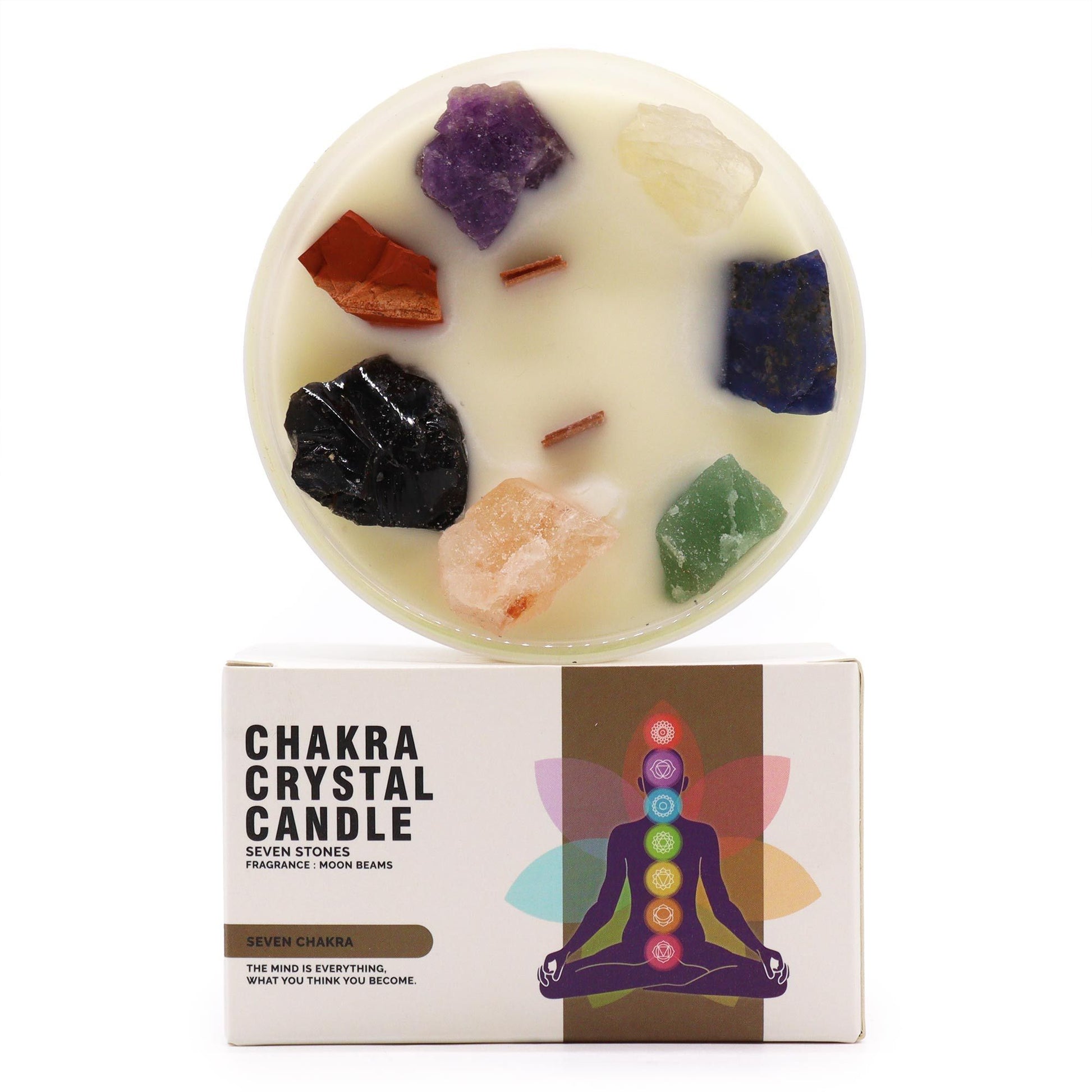 Top-down view of a Seven Chakra soy wax candle showing seven different raw healing stones and wood wicks with its branded box.
