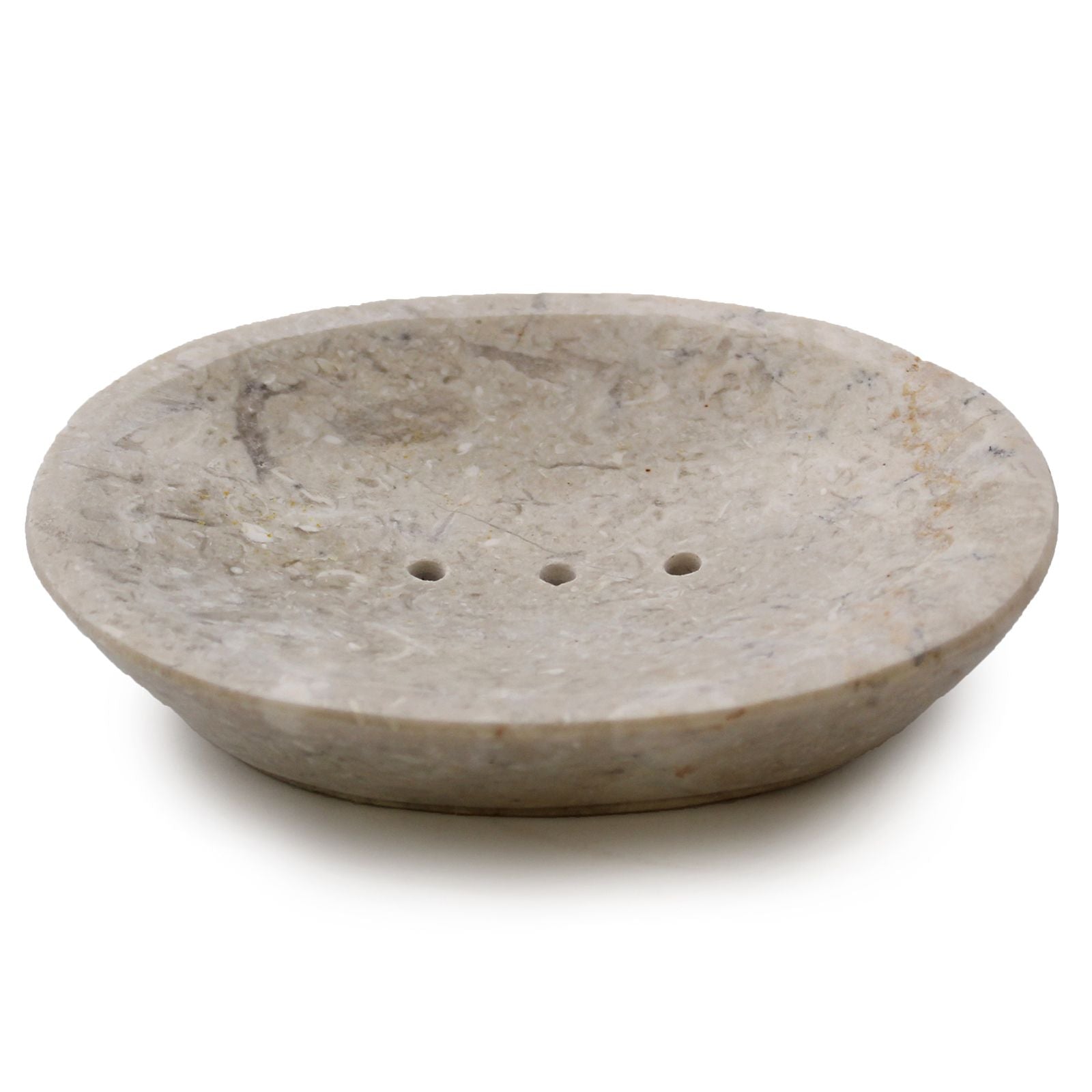 A wide, shallow oval soap dish made from polished cream-colored marble featuring natural dark grey speckles.