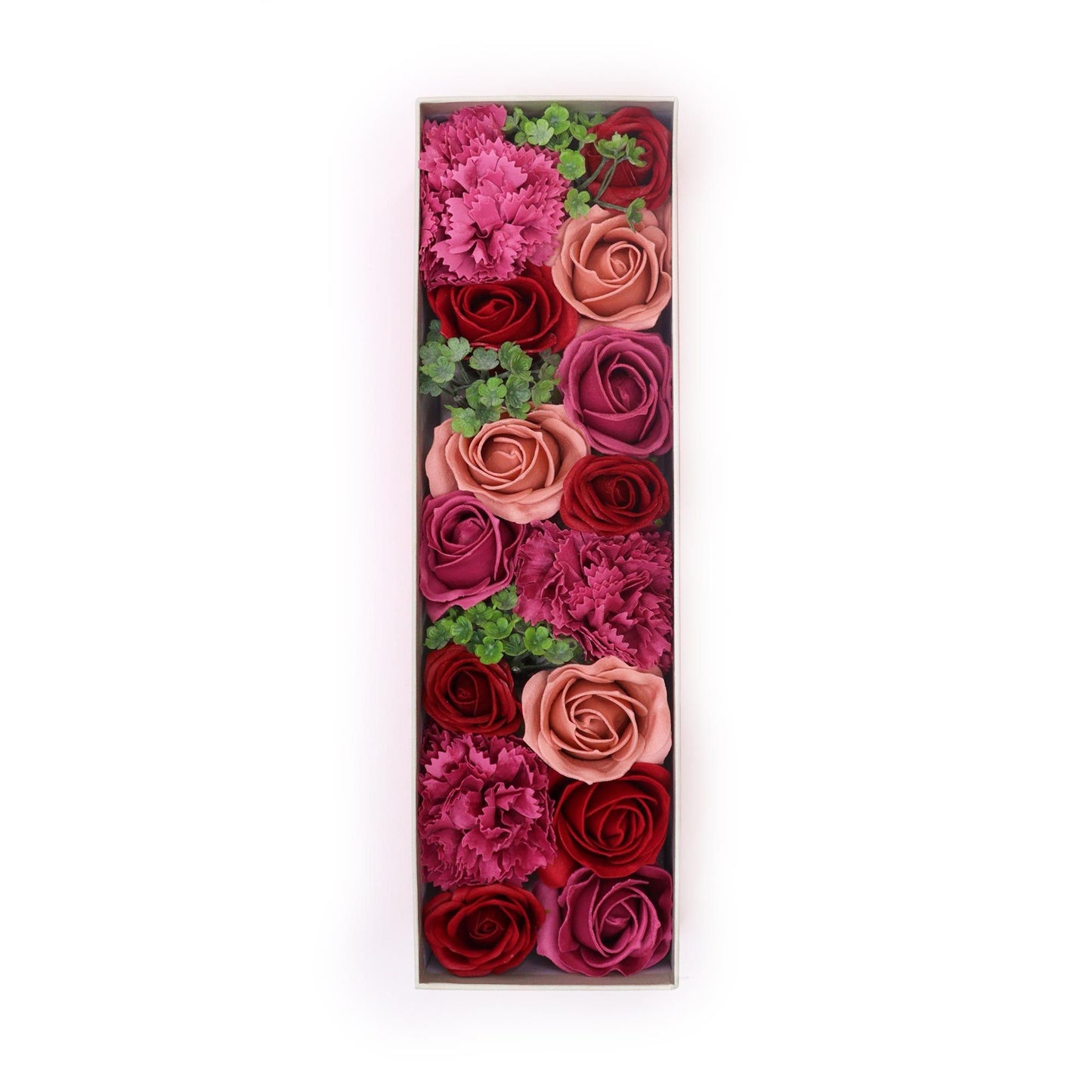 A luxury red long gift box filled with realistic antique-style pink and mauve soap roses arranged in a decorative display.