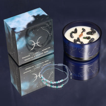 A blue-themed Zodiac candle for Pisces featuring embedded crystals and a hidden gemstone bracelet inside the wax.