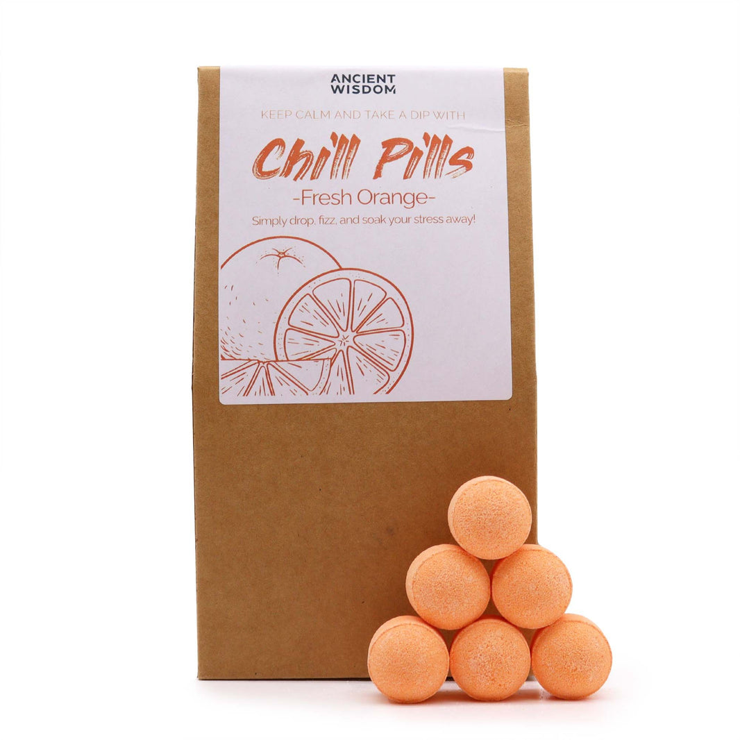 A kraft paper pouch with a clear window showing numerous small, bright orange citrus-scented bath bomb spheres.