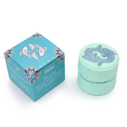 A light blue zodiac gift box for Pisces, featuring themed bath fizzers and a personalized horoscope card.
