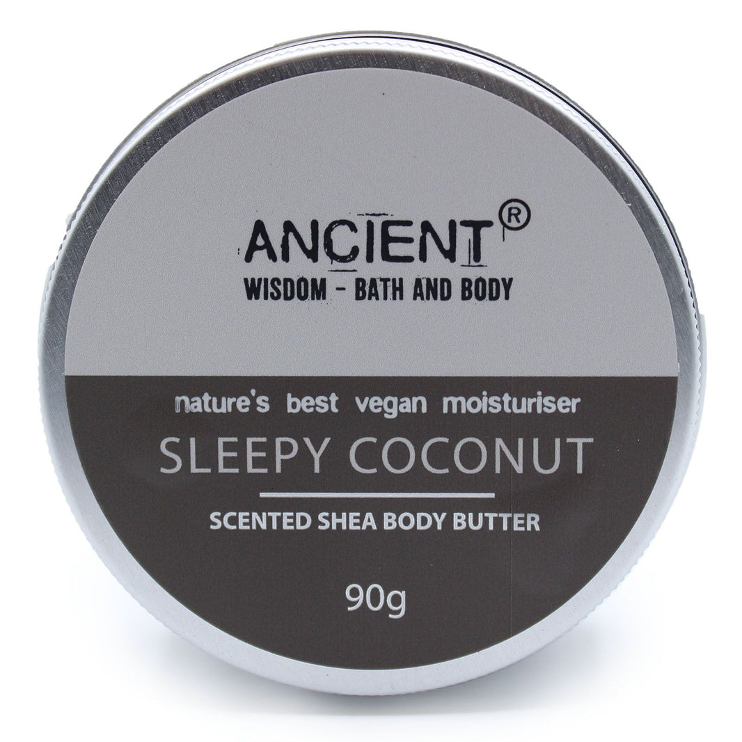 A 90g jar of white shea body butter featuring a calming coconut fragrance and a premium black and silver label.