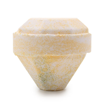 A large 190g gemstone-shaped bath bomb in a cream and gold marble effect with a sophisticated luxury fragrance.