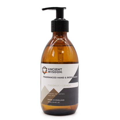 A premium amber glass dispenser bottle with a professional pump top, containing luxury coconut and lemon liquid wash.
