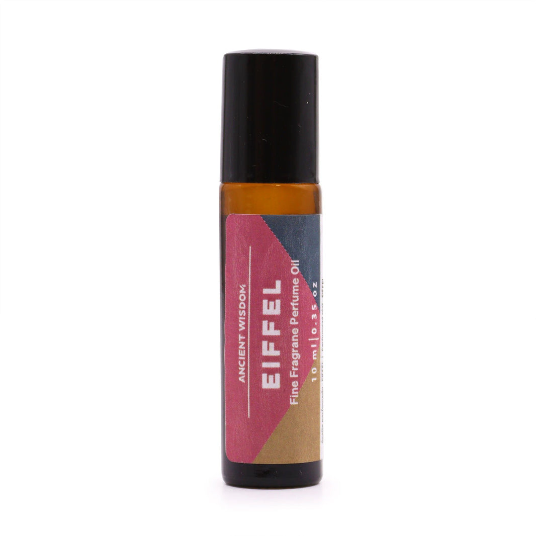 A compact 10ml rollerball perfume oil bottle featuring a pink and white label with elegant French-inspired typography.