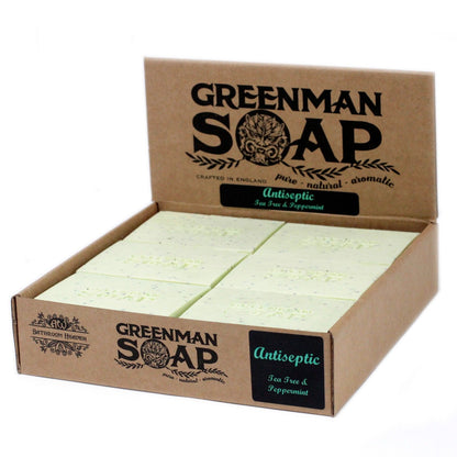 A 100g white artisan Greenman soap bar designed with antiseptic essential oils for targeted facial and body care.