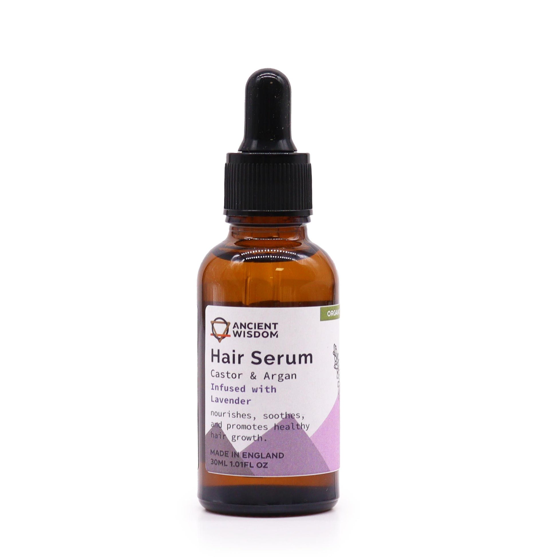 A 30ml amber dropper bottle of organic lavender hair serum with a professional apothecary-style label.