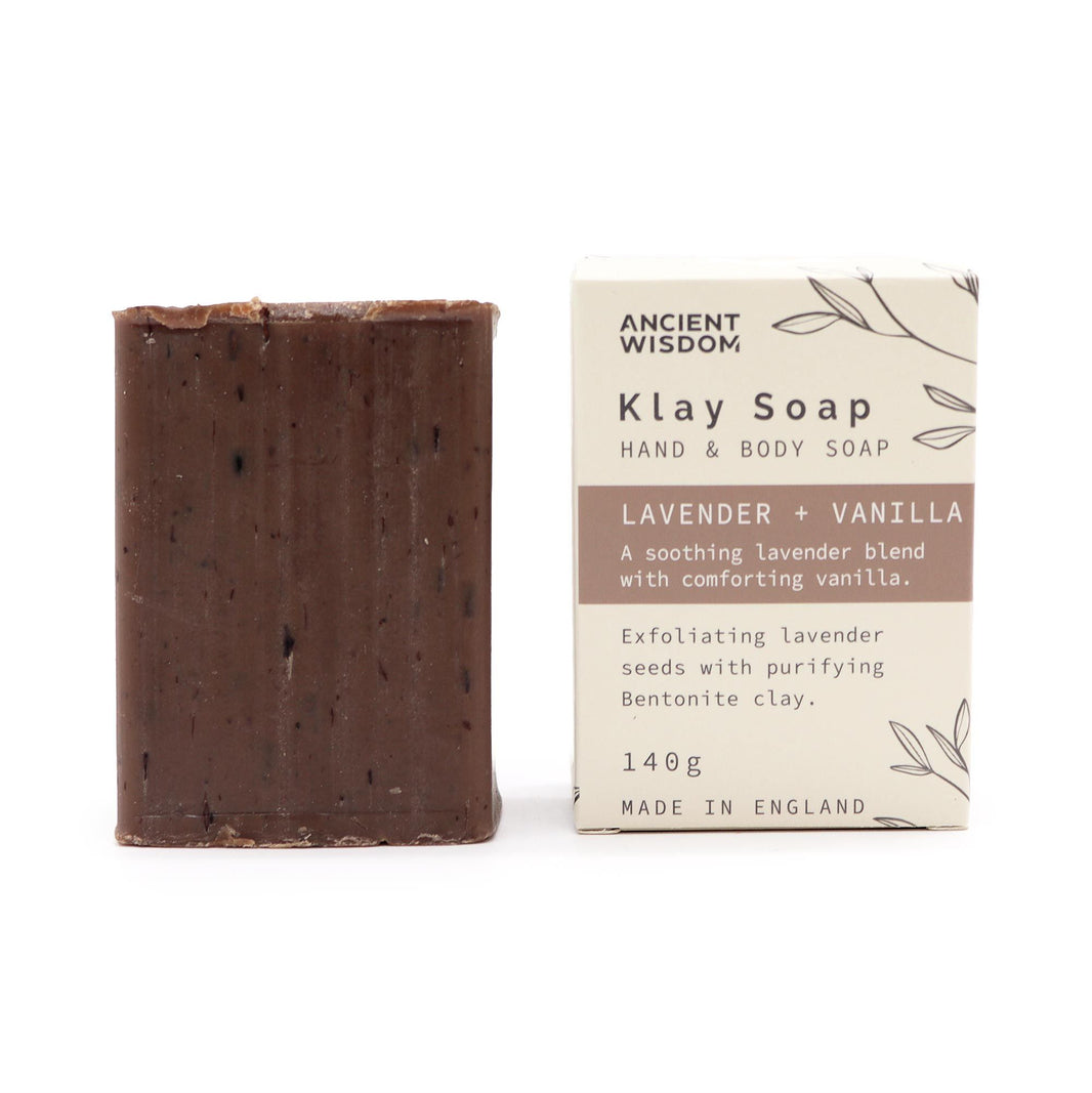 A dark, handcrafted clay soap bar featuring a soothing blend of lavender and sweet vanilla scents.