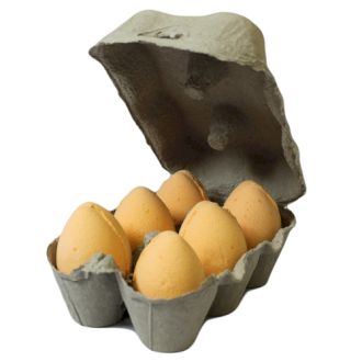 A realistic grey egg carton containing six orange-colored bath bombs shaped like eggs for a playful gift.