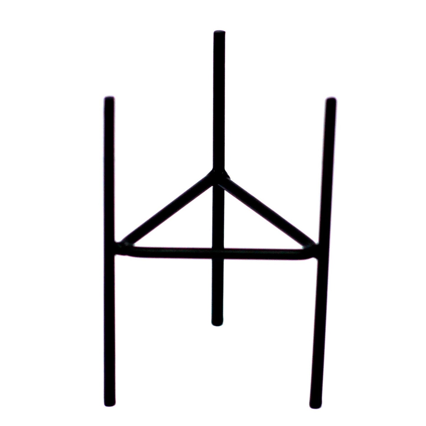 A black metal iron candle holder with a minimalist geometric design, perfect for holding botanical glass candles.