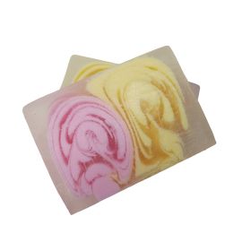 A 115g artisan soap slice featuring pink and cream layers and a fragrant, floral magnolia scent.