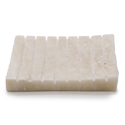 A rectangular white onyx soap dish with a ridged surface, carved from natural semi-precious stone.