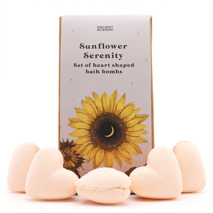 A decorative gift box containing multiple yellow and white heart-shaped bath bombs from the Sunflower Serenity collection.