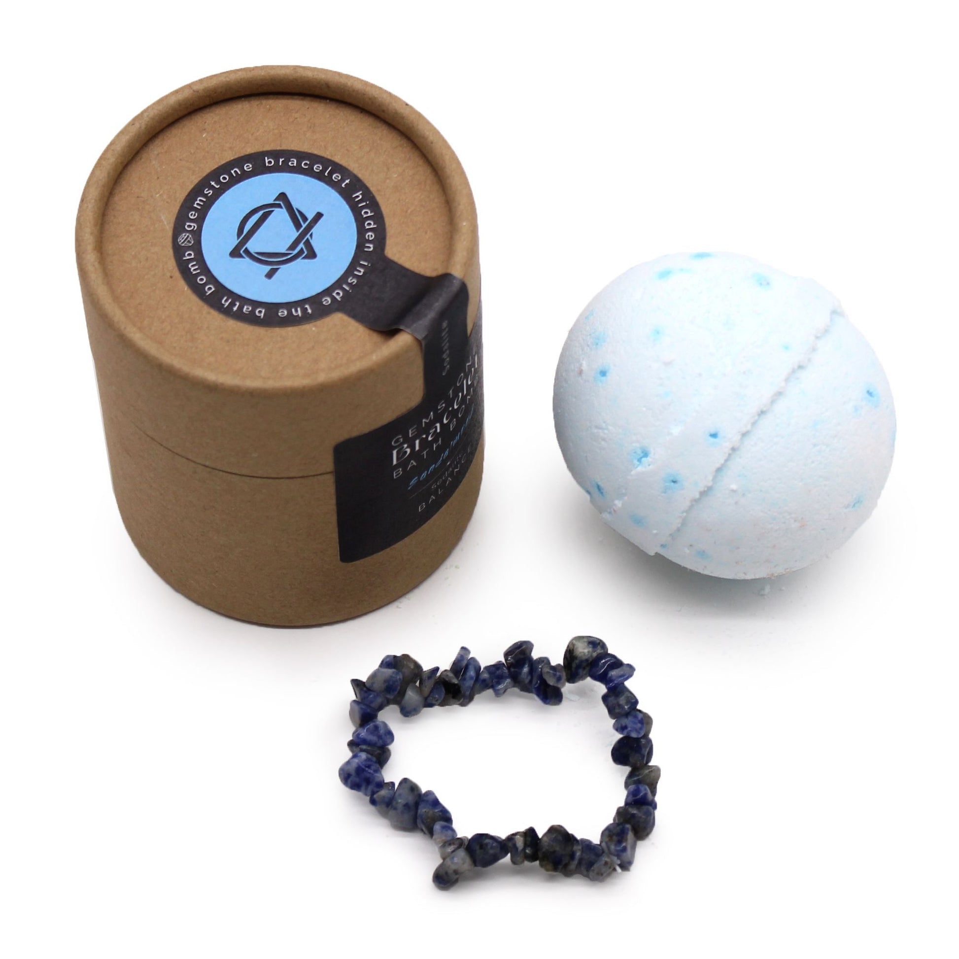 A blue and white 170g bath bomb with a genuine Sodalite gemstone bracelet shown as the hidden gift inside.