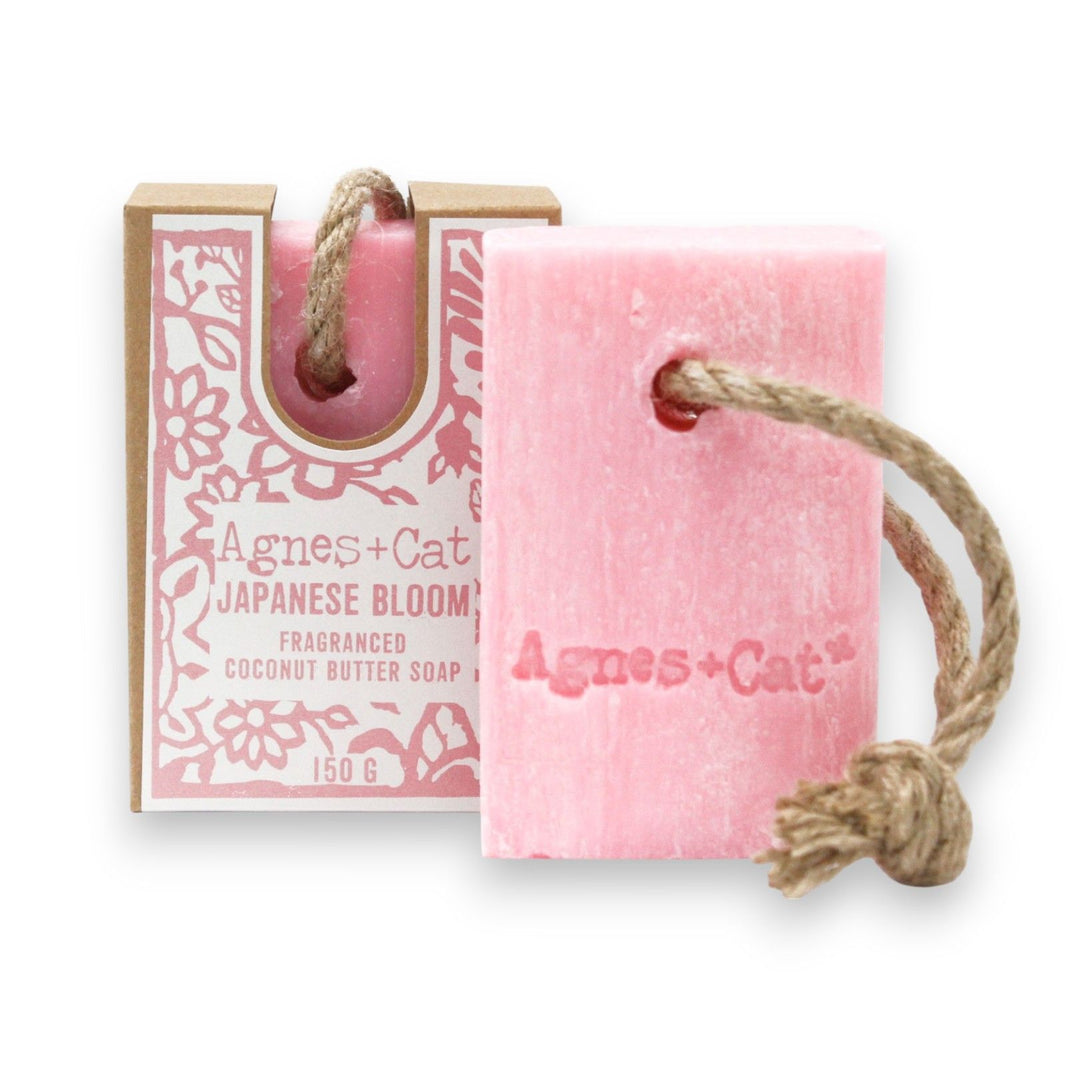 Artisan 150g soap on a rope with Japanese Bloom floral fragrance, showing pink and cream botanical layers and natural rope.