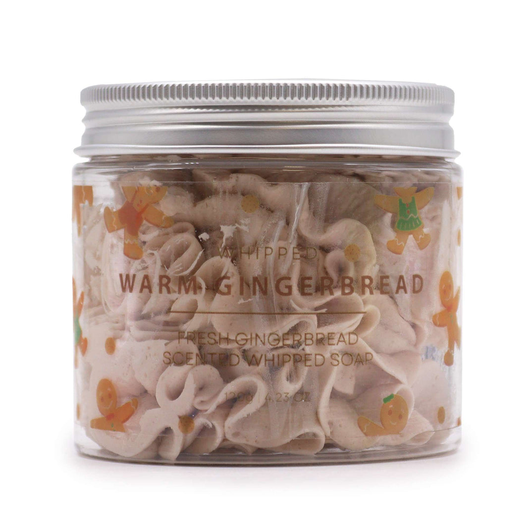A 120g jar containing brown-toned whipped cream soap scented like warm gingerbread with an illustrated apothecary label.