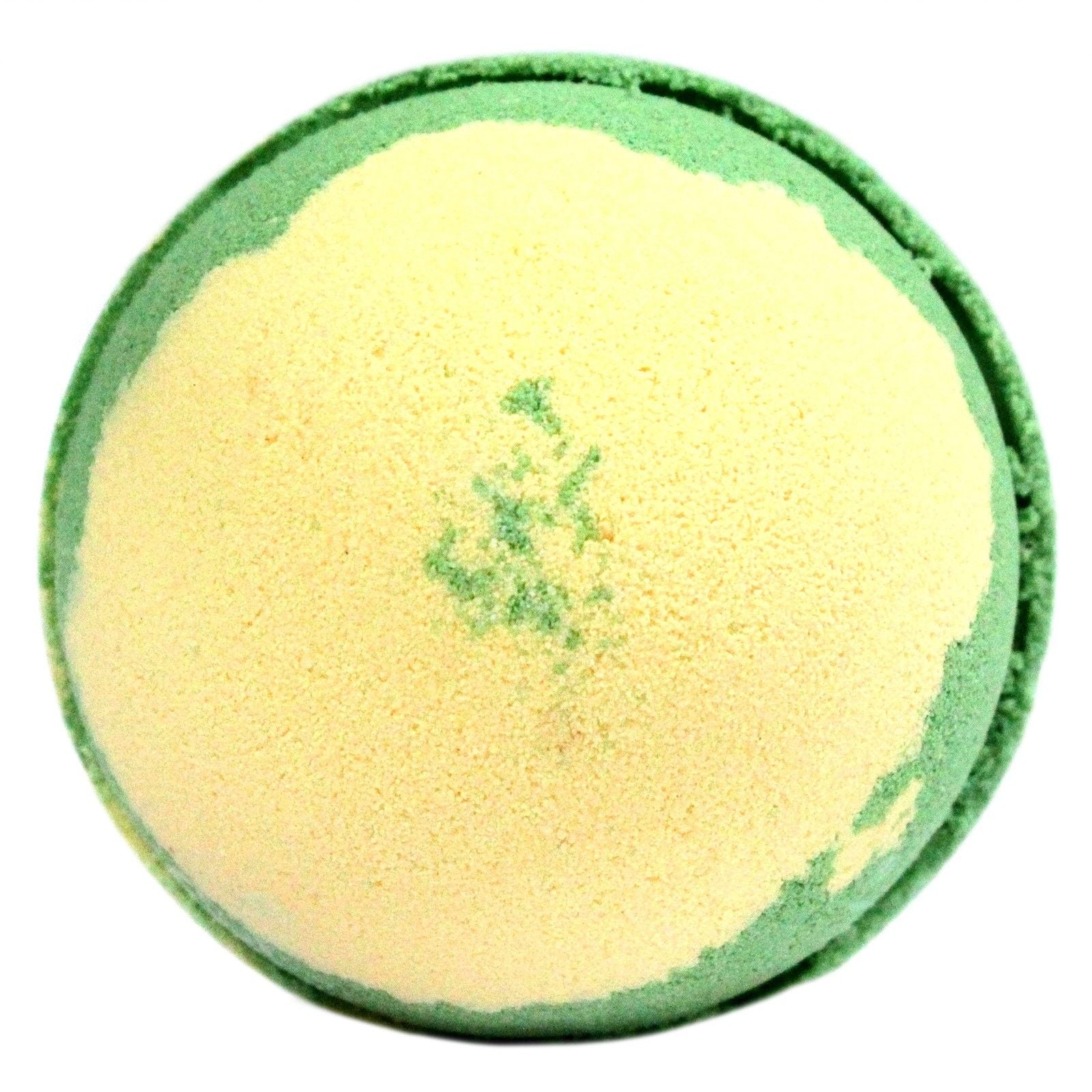 A large round bath bomb featuring a pale green and cream swirl, designed to smell like a classic apple dessert.