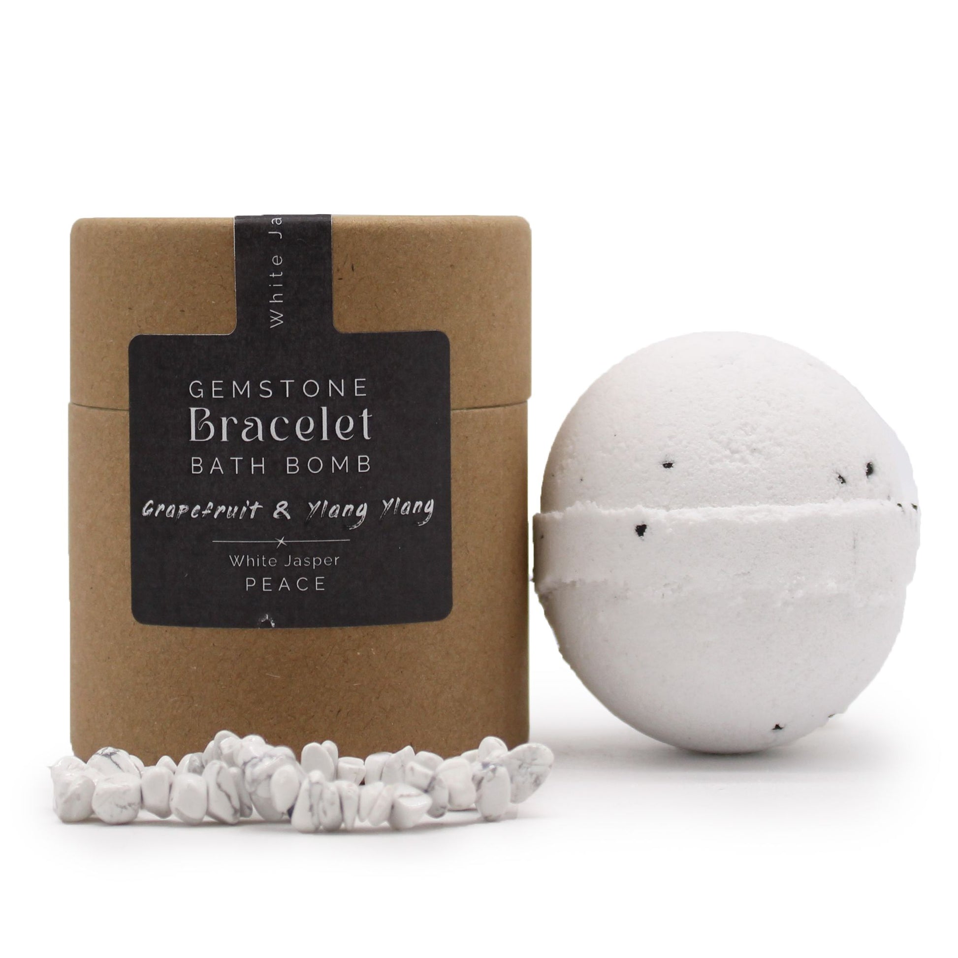 A 170g white bath bomb with a white Jasper gemstone bracelet displayed as a hidden treasure inside, perfect for spiritual gifting.