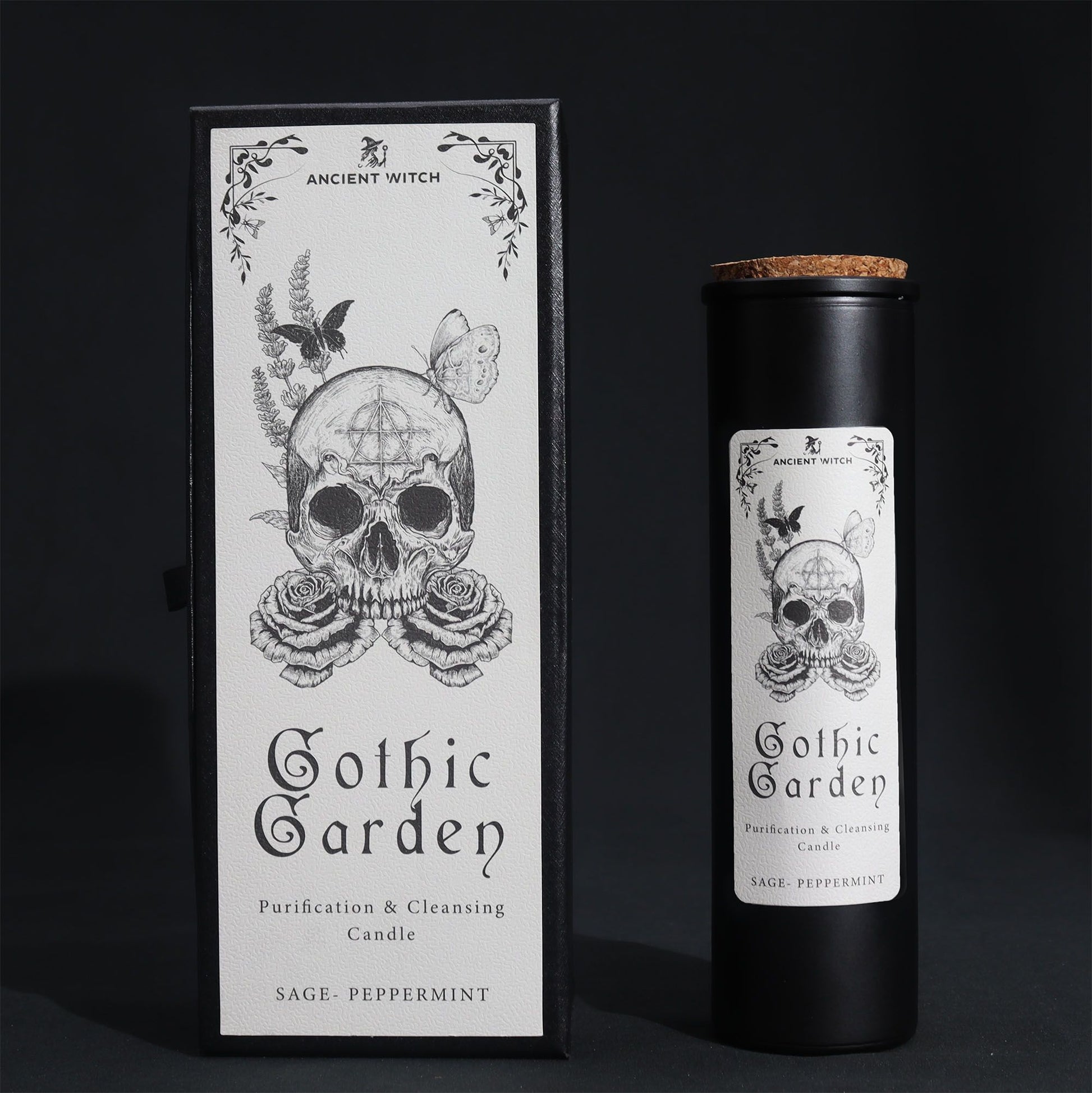 A tall black ritual candle in a premium black box with white Victorian-style gothic botanical illustrations.