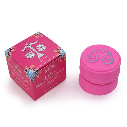 A pink-themed set of zodiac bath fizzers for the Libra sign, featuring the libra scales symbol and personalized horoscope info.