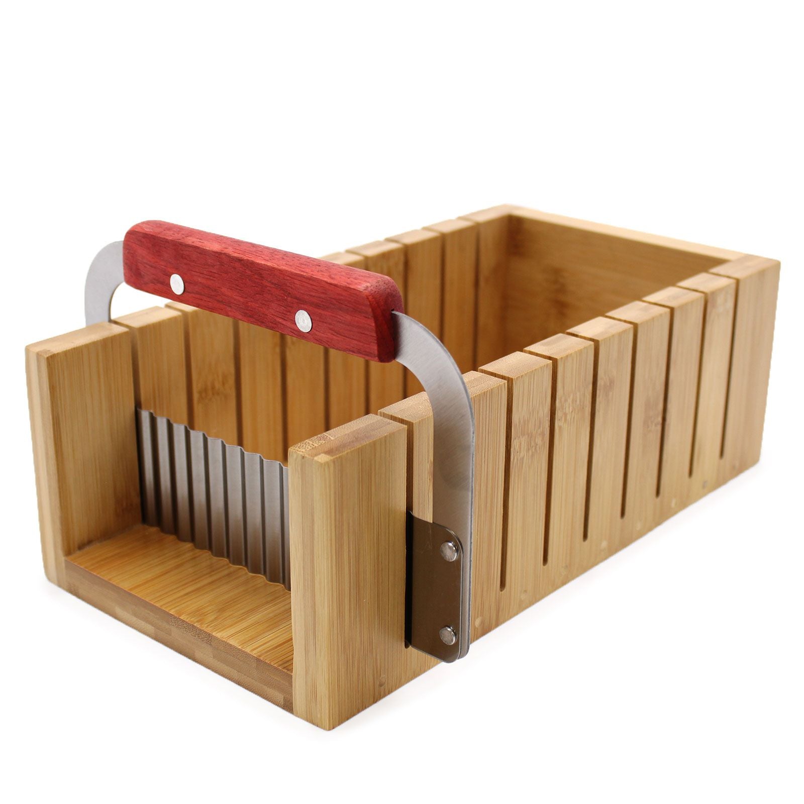 A wooden soap cutting miter box with two different metal scrapers: one straight blade and one wavy "crinkle" cutter.